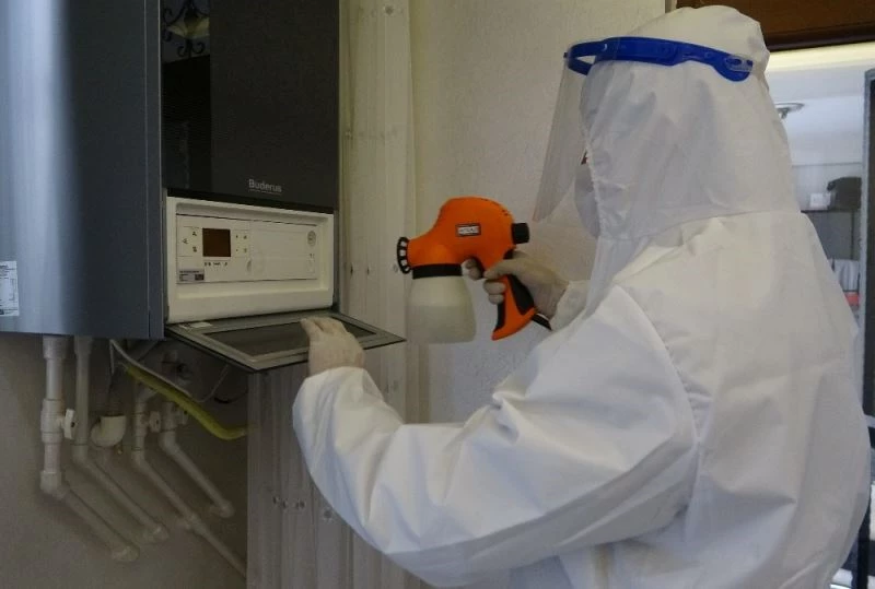 (Özel) Kombi bakımında koruyucu elbise ve maske dönemi
