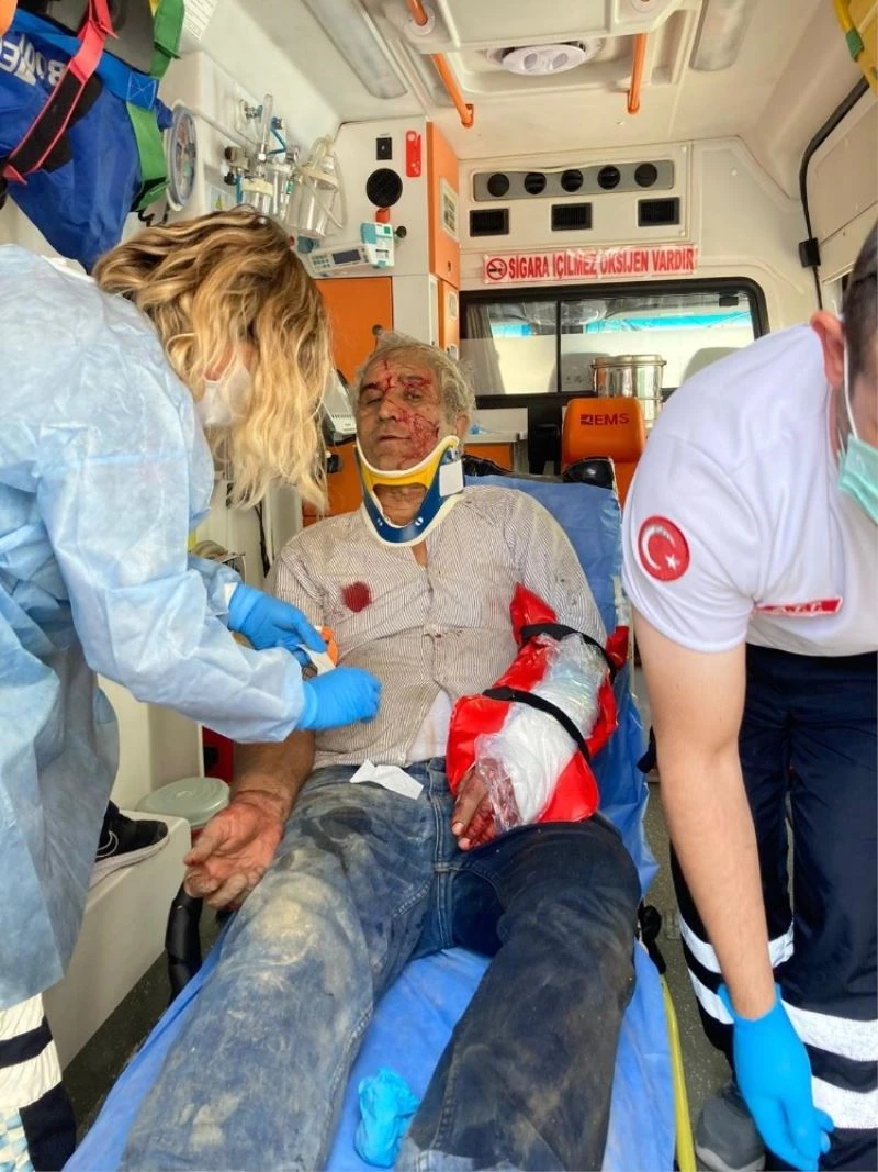 Yıkılan binadan kopan parçalar işçinin üstüne düştü
