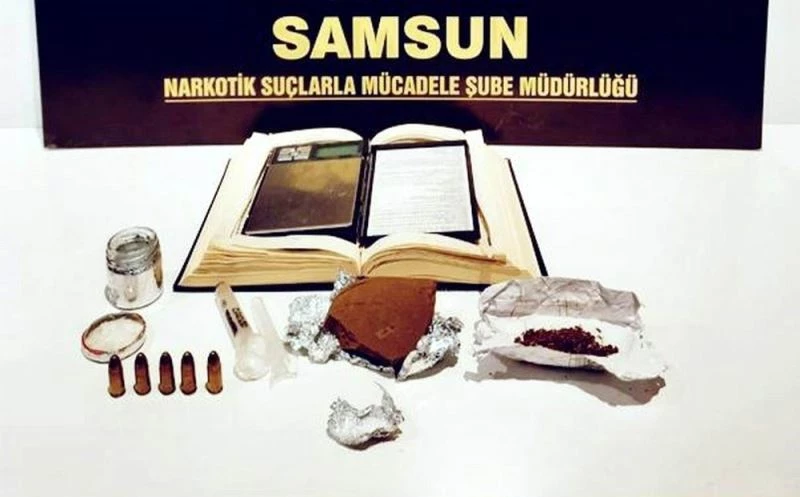 Uyuşturucu terazisini kitabın içine gizlemişler
