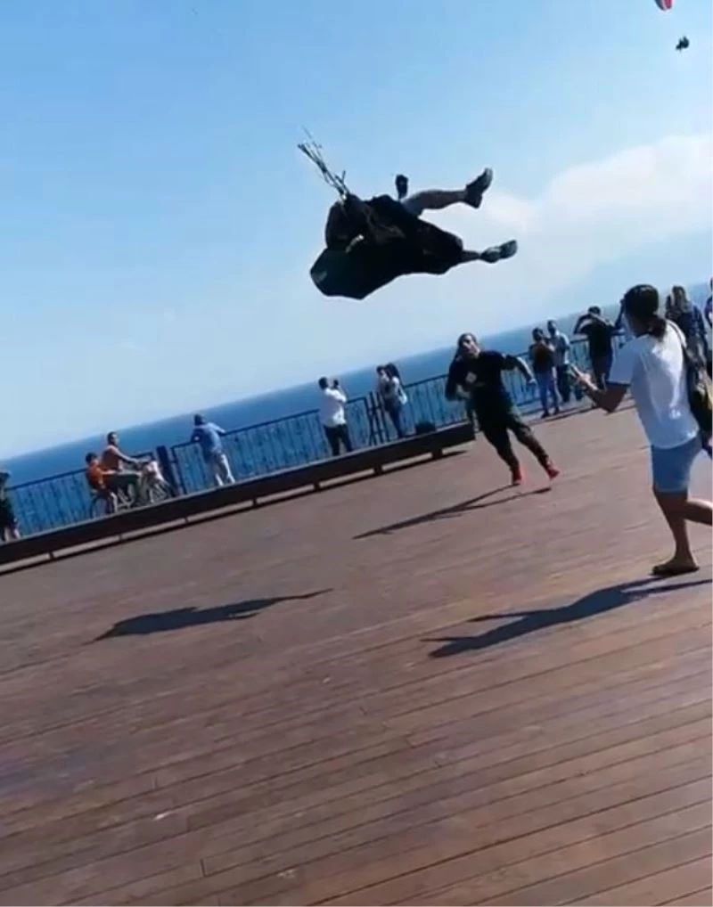 Uçuş yapmaya hazırlanan yamaç paraşütçüsü rüzgarın azizliğine uğradı
