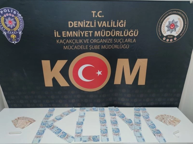 Sahte paraya orijinal hissi vermek için mum kullanmışlar
