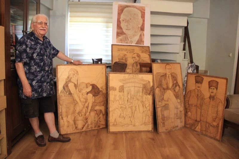 1 buçuk milyon kağıdı yapıştırarak resim yaptı
