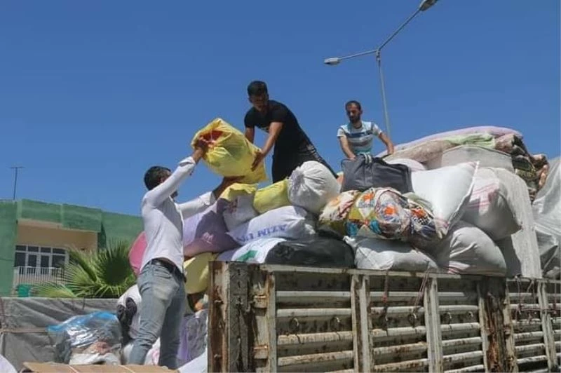 Kozan Ülkü Ocaklarından yangınzedelere 1 tır dolusu yardım
