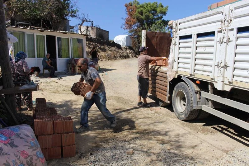 Yangınzede ailelere inşaat malzemesi desteği

