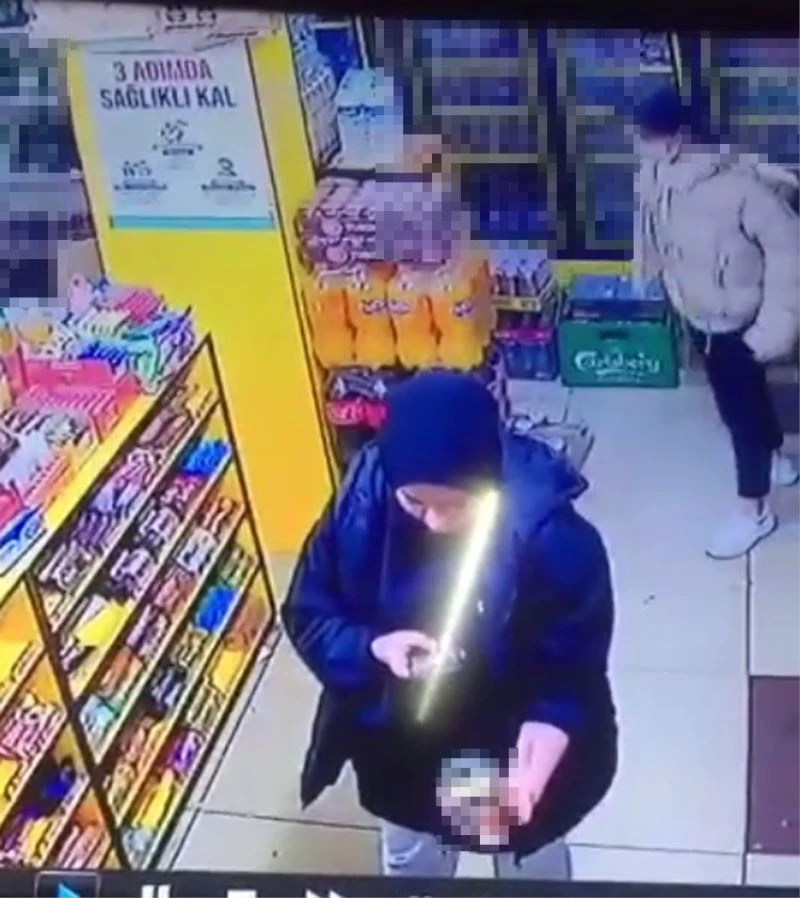 Fotoğrafını çektiği içkiyi montuna saklayıp çaldı
