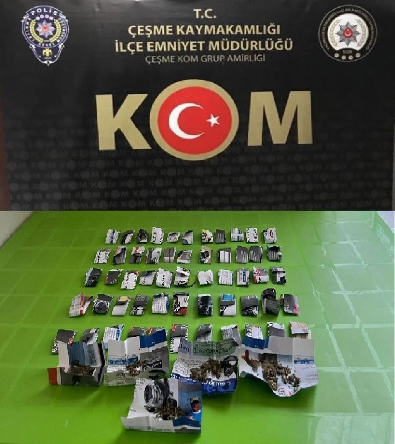 Gazete kağıtlarına sardığı uyuşturucularla yakalandı
