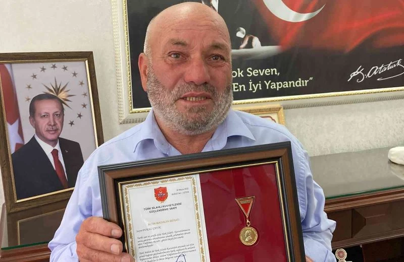 Vefalı çiftçiyi ağlatan madalya
