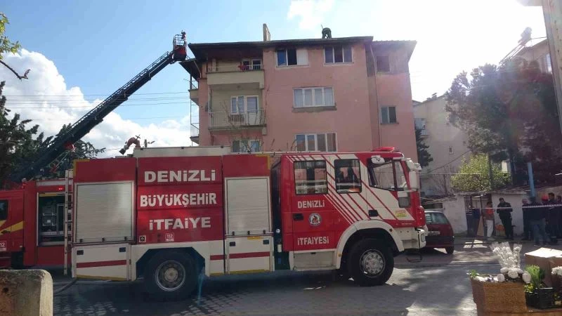 Çatısını alevlerin kapladığı binada korku dolu anlar yaşandı
