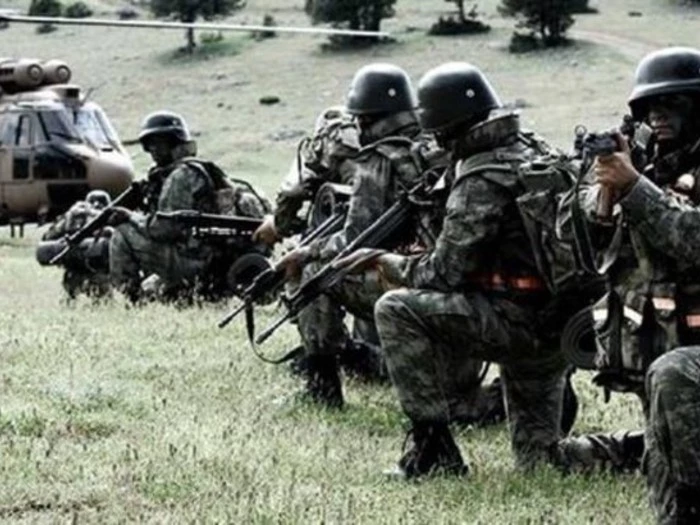 Amanoslarda toprağa gömülü, keleş mermisi ve dolar bulundu